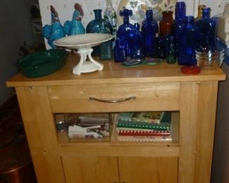 kitchen cabinet (great small island) & collection of cobalt blue bottles