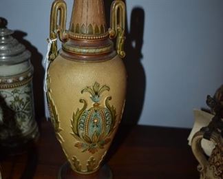 Beautiful double handled vase, the stein to the left was kept by the family