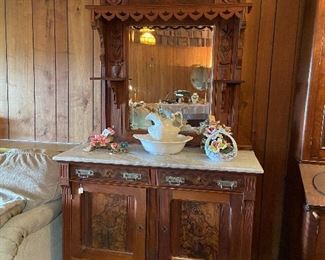 Another incredible hutch!  Marble top, very detailed, carved wood.