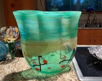 green glass vase with xs