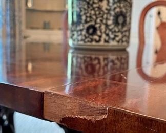 detail - please note the missing veneer