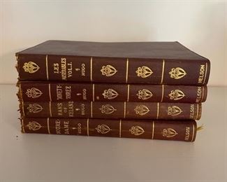 Set of 4 Leather Bound Books.