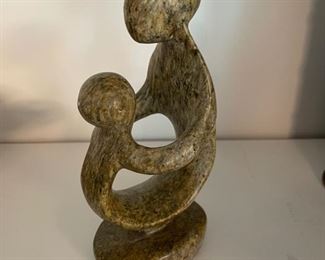 Carved Stone Mother and Child Statue. Photo 1 of 2.