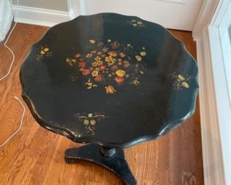 Vintage Tea Table with ebony & floral high-gloss finish. Measures 22" D x 27" H.