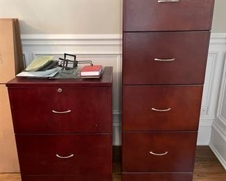 Two-drawer and four-drawer wood file cabinets.