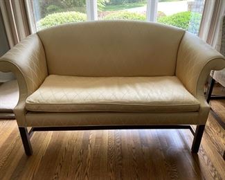Baker Roll Arm Settee with pale lemon silk upholstery. Measures 64"W with 22" Seat Depth. Upholstery matches the Hendredon featured in previous photo.