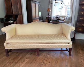 Vintage Henredon Camelback Sofa with rollover arms, fretwork legs, pale lemon upholstery and down-filled cushion. 75"W x 33"H x 20"D. Photo 1 of 2