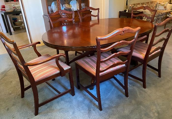 Mahogany dining table (has 2 leaves) & 6 ribbon back  chairs 