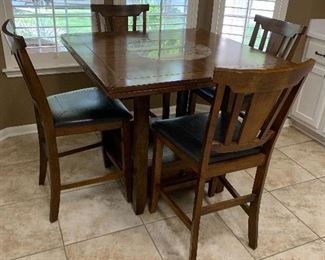 $575- Dining table with marble inset 