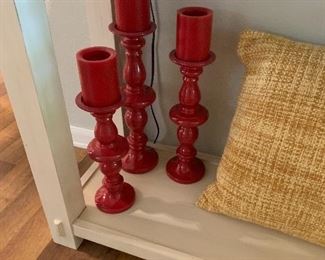 $32- Set of three res candle holders 