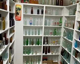 bottle collection and custom lighted shelves.