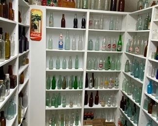 bottle collection and custom lighted shelves.