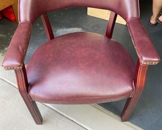 2 leather barrel back chairs