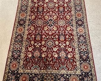 Oriental Rug Burgundy w/ navy border 5’ x 3’