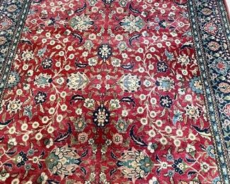 Oriental Red Rug w/ blue border 5’3” x 8’4”