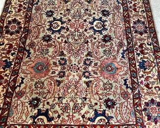 Oriental Rug 7’8” x 5’3” w/ greens, reds & blues