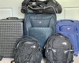 Assortment of suitcases & backpacks 