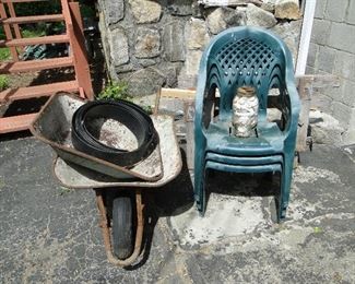 Chairs and wheelbarrow