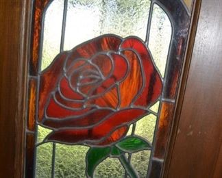 Stained Glass Window in Front door.  Front door will be sold as an entire unit.