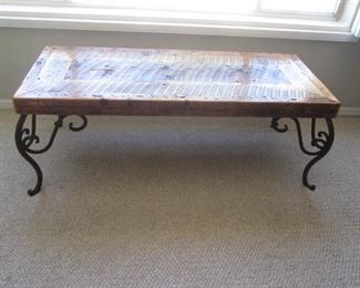 Coffee Table, Metal Legs with multiple Woods forming the Table Top.  An Original Designed by Tim McClellan of Western Heritage,  Jerome, AZ, 2004.                                         44" X 18" X 16"