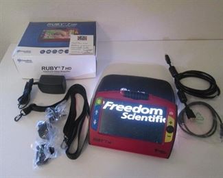 Freedom Scientific Handheld Ruby with 7" HD Screen.  Low Vision Magnifier.  Works!  Great for at home or traveling.  $1195 Retail.