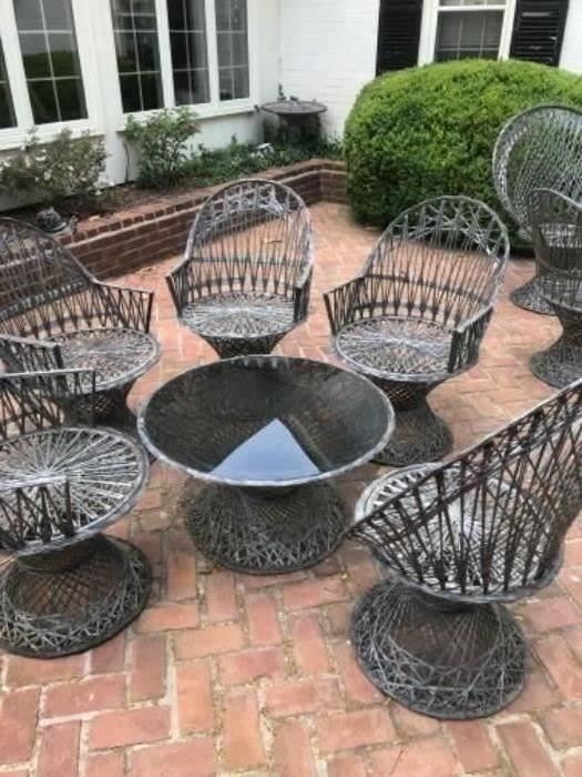Spun Fiberglass Russell Woodard style outdoor dining. 2 tables and 9 chairs available. Table and 5 chairs $1500.00. A  table and 4 chairs is $1200.00 
