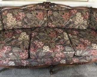 Floral Chippendale styled upholstered sofa. 