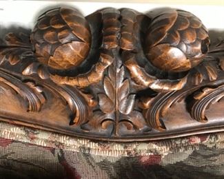 Ornate wood carving in sofa back 