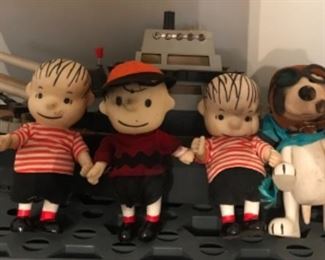 Linus, Charlie Brown, Snoopy stuffed toys. 
