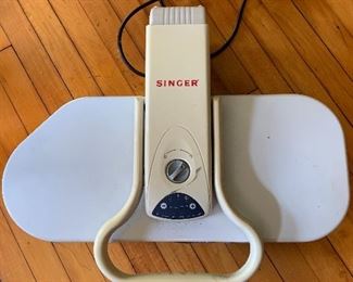 Singer electronic press