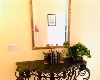 Ornate beveled gold mirror, 1 of 2 Marble top console tables with iron base