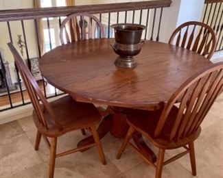 oak pedestal table with 4 chairs