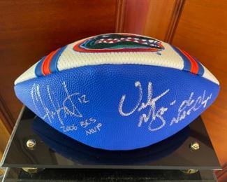 Florida Gators signed (Meyer and Leak)football in case with COA...