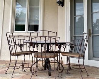 wood and metal patio set with 6 chairs