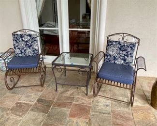 brown metal rocking chairs, outdoor glass top end table, garden stool