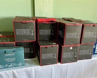 Several sets of Riedel wine glasses in box. 
