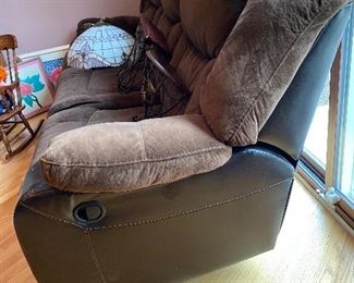 Leather/fabric reclining sofa