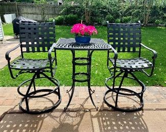 $100 - Outdoor High-Top Wrought Iron Table   28”L x 28” W x 38” H                                                                                  $400 - Pair of Bar Height Outdoor Swivel Chairs 21.5” W x 26” x 43”H 