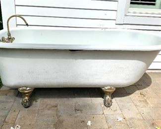 $150 Claw-footed Bathtub w/ brass feet and fixtures