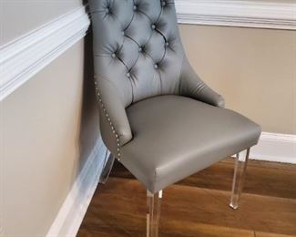 Leather button tufted acrylic legs