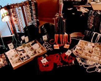 Lots of beautiful jewelry  some never worn. Brands including honors pearls, Bob Mackie, Joan Rivers, Nolan Miller and more...