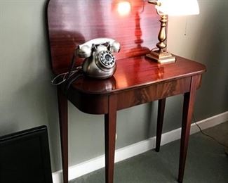 Vintage Mahogany Game Table ($125) with antique style phone and desk lamp