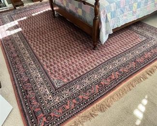 $799.00  Large geometric Karastan woven coral and charcoal wool area rug.  8'8" x 11'8"  Superb condition, no pets.