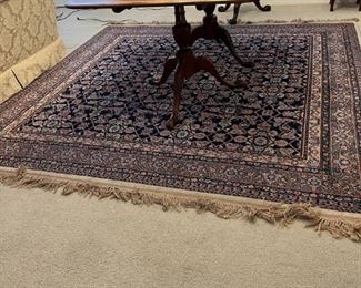 $600.00  Karastan woven cobalt and peach wool area carpet.  Pristine condition with intricate detailing .  8'8" x 8'5"