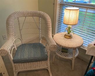 White wicker rocker and table