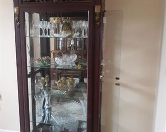 Ornate Mirrored etagere with glass shelves