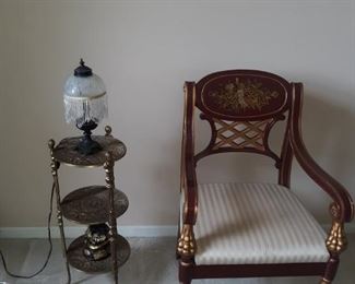 Brass stand and decorative arm chair