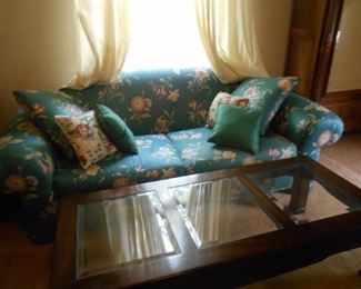 Sofa and glass top coffee table