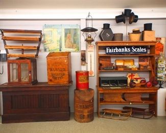 Counter items, Galvanoid screen, coffee bin, oil lamp, advertising signs, sleds, postcards, etc