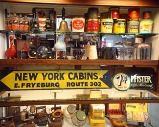 Irons, advertising signs, store tins, hand bell, fireplace bellow, country store items, etc